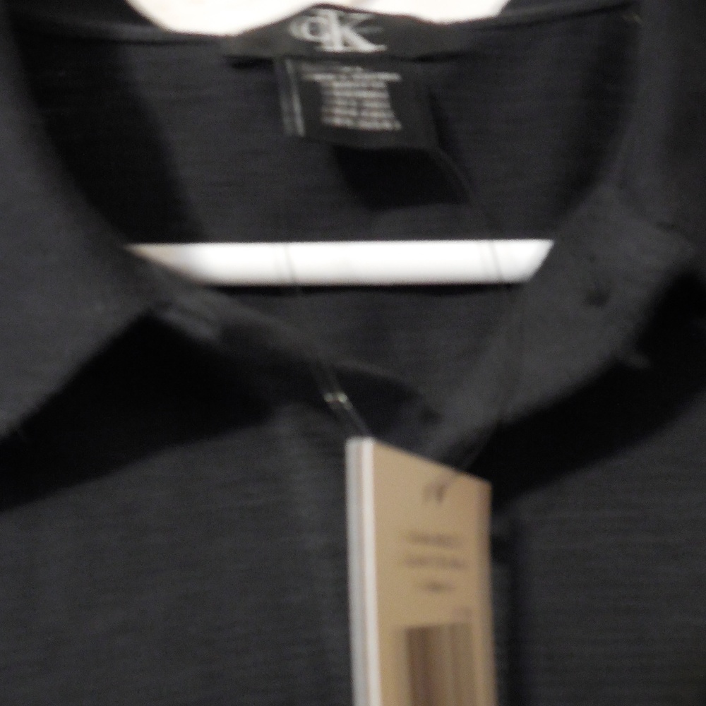 NWT Calvin Klein Polo size XL Black top